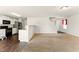 Open-concept living room and kitchen with stainless steel appliances at 350 Pillow Ln, Burlington, NC 27217