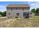 Exterior backyard with a covered patio, outdoor furniture, and an expansive yard at 351 Lowery Ln, Benson, NC 27504