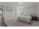 Bedroom with a bed, two windows, and carpet flooring at 351 Lowery Ln, Benson, NC 27504