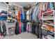Walk-in closet with ample storage and organized shelving at 351 Lowery Ln, Benson, NC 27504