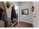 Inviting entryway with coat rack, mirror, and decorative accents at 351 Lowery Ln, Benson, NC 27504