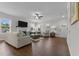 Spacious living room with hardwood floors, a fireplace, and plenty of natural light at 351 Lowery Ln, Benson, NC 27504