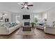 Bright open concept living room, featuring a fireplace and neutral decor at 351 Lowery Ln, Benson, NC 27504