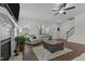 Cozy living room features hardwood floors, a fireplace, and neutral furnishings at 351 Lowery Ln, Benson, NC 27504