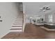 Open floor plan with living room and kitchen area and staircase at 351 Lowery Ln, Benson, NC 27504