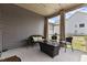 Screened patio with wicker furniture at 351 Lowery Ln, Benson, NC 27504
