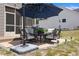 Brick patio with umbrella and patio furniture at 351 Lowery Ln, Benson, NC 27504