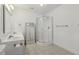Bathroom featuring dual sinks, shower and tile flooring at 418 S West St, Cary, NC 27511