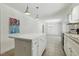 Open concept dining room showcasing a chandelier and tile flooring at 418 S West St, Cary, NC 27511