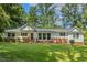Charming single-story home with brick accents and a well-manicured lawn at 418 S West St, Cary, NC 27511