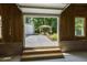 View of the backyard and gazebo, as seen from inside the garage at 418 S West St, Cary, NC 27511