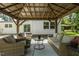 Gazebo with comfortable seating and views of the backyard at 418 S West St, Cary, NC 27511