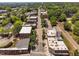 Aerial cityscape showcasing the town's buildings, tree-lined streets, and historical architecture at 421 Wait Ave # 100, Wake Forest, NC 27587