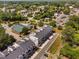 Aerial view of the neighborhood, showcasing residential buildings, green spaces, and local amenities at 421 Wait Ave # 100, Wake Forest, NC 27587