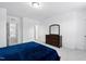 Bedroom featuring carpet flooring, a dresser with mirror, and access to an ensuite bathroom at 421 Wait Ave # 100, Wake Forest, NC 27587
