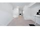 Spacious bonus room with carpeted floors, white walls, and a view of the hallway at 421 Wait Ave # 100, Wake Forest, NC 27587