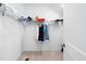 Walk-in closet featuring ample storage space with wire shelving and carpeted floor at 421 Wait Ave # 100, Wake Forest, NC 27587