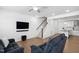 View of open concept living room showcasing modern finishes and ample space at 421 Wait Ave # 100, Wake Forest, NC 27587