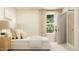 Bright bedroom with king bed, bedside tables, lamps, decor, and window at 43 Regal Gardens Ct, Angier, NC 27501