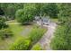 Aerial view showcases the well-maintained grounds and long driveway at 4605 Malor Dr, Wake Forest, NC 27587