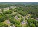 Overhead view of the landscape and neighborhood, highlighting the surrounding trees and residential charm at 4605 Malor Dr, Wake Forest, NC 27587