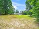 Backyard view of a house with a white fence at 4605 Malor Dr, Wake Forest, NC 27587