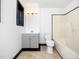 Bathroom with tile flooring, a single sink vanity, and a shower-tub combination at 4605 Malor Dr, Wake Forest, NC 27587