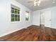 Bedroom featuring hardwood floors, ceiling fan, and a window at 4605 Malor Dr, Wake Forest, NC 27587