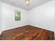Bright bedroom with hardwood floors and natural light from a window at 4605 Malor Dr, Wake Forest, NC 27587