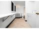 Laundry room featuring tile flooring, overhead lighting, and a utility sink at 4605 Malor Dr, Wake Forest, NC 27587