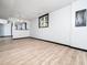Spacious living room boasts hard surface floors, recessed lighting, and open floor plan at 4605 Malor Dr, Wake Forest, NC 27587