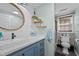 Stylish bathroom showcasing a modern vanity with a vessel sink, wood accents, and a convenient toilet room at 4701 Governor Hunt St, Efland, NC 27243