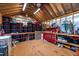 Interior shot of outbuilding with exposed wood and storage at 4701 Governor Hunt St, Efland, NC 27243