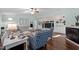 Living room with built in shelves and fireplace at 4701 Governor Hunt St, Efland, NC 27243