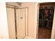 Bathroom with a tiled walk-in shower and a well-organized walk-in closet at 474 Ashpole Trl, Clayton, NC 27520