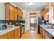 Well-equipped kitchen with stainless steel appliances and granite countertops at 509 Spruce Meadows Ln, Willow Springs, NC 27592
