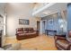 Spacious living room boasts hardwood floors, a cozy fireplace, and plenty of natural light at 509 Spruce Meadows Ln, Willow Springs, NC 27592