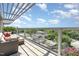 Spacious balcony with glass railings and pergola, perfect for outdoor relaxation at 601 W Rosemary St # 715, Chapel Hill, NC 27516