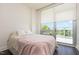 Inviting bedroom with large windows, offering natural light and peaceful outdoor views at 601 W Rosemary St # 715, Chapel Hill, NC 27516
