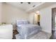 Cozy bedroom featuring a plush rug, a modern bed, and a dedicated workspace at 601 W Rosemary St # 715, Chapel Hill, NC 27516