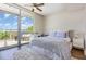 Bright bedroom with balcony access, offering a serene view and cozy ambiance at 601 W Rosemary St # 715, Chapel Hill, NC 27516