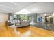 Elegant lobby space featuring hardwood floors, contemporary furniture, and natural light from skylight at 601 W Rosemary St # 715, Chapel Hill, NC 27516