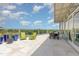 Expansive outdoor patio featuring dining and seating areas with lovely views and stylish planters at 601 W Rosemary St # 715, Chapel Hill, NC 27516