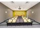 Spacious theater with tiered seating, projector, and screen for an immersive viewing experience at 601 W Rosemary St # 715, Chapel Hill, NC 27516
