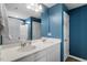 Bathroom with double sink vanity with white countertops and modern fixtures at 637 Marrian Dr, Clayton, NC 27520