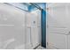 Bathroom shower features a white tile surround, glass door, and chrome fixtures at 637 Marrian Dr, Clayton, NC 27520