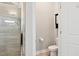 Modern toilet in a private bathroom space, next to a tile shower at 7801 Charters End St, Willow Springs, NC 27592