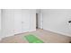 Empty bedroom with a closet, neutral paint, and carpeted floors at 7801 Charters End St, Willow Springs, NC 27592