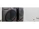 Side by side, front-loading washer and dryer in the laundry room at 7801 Charters End St, Willow Springs, NC 27592