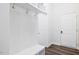 Mud room with bench, coat hooks and storage, right next to the front door at 7801 Charters End St, Willow Springs, NC 27592